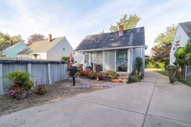 From garage looking at enclosed patio, note the permanent gas grill