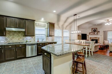 Island offers addistional cabinet space as well as breakfast bar seating