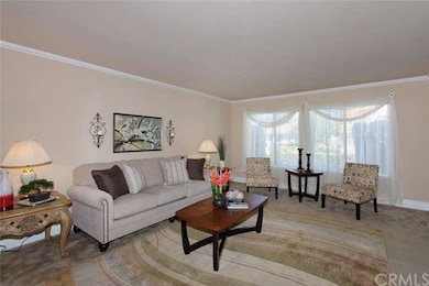 Formal living room - crown molding and upgraded ba