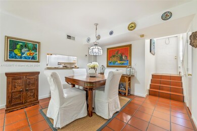 Dining Area Adjacent to Kitchen Pass-Thru