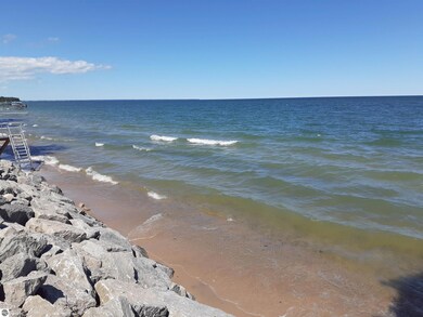 50 ft of Sandy beach to sink your toes in!