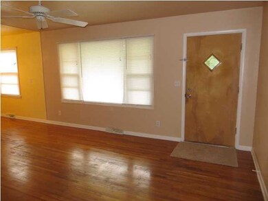 Beautiful hardwood floors and lots of light are fe