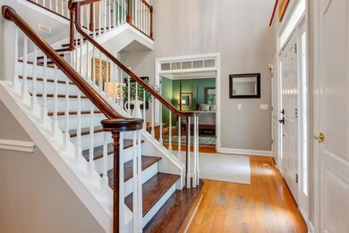 Notice the newer wooden treads on stairs, plus all hardwoods down....