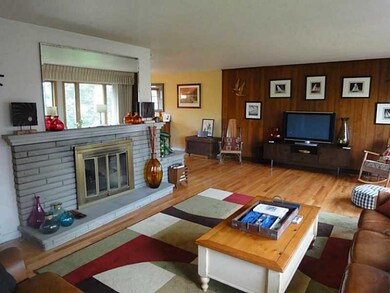 Living Room. The fireplace, with it s wide hearth,