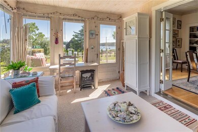 Sunroom with a deck extending out....