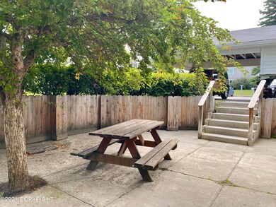 Semi-enclosed front patio