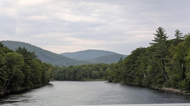 34 Hubbard Grove Rd, Shelburne, NH 03581 - photo 2