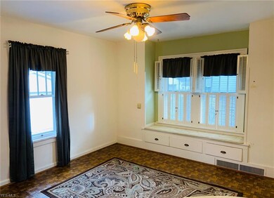 Dining room complete with window seat and plantati