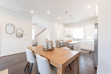 Elegant dining area seamlessly connected to a mode