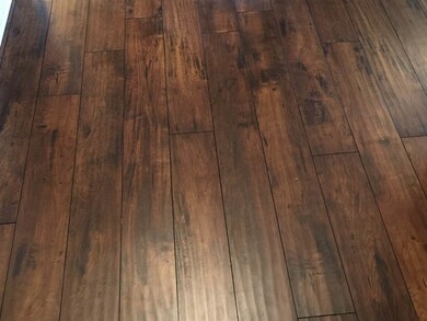 Beautiful flooring in Den and Hallway.