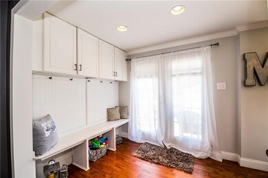 Two sets of doors open from this addition to a dec