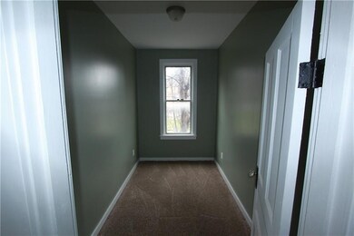 Den - New paint, carpet, and lighting fixture.