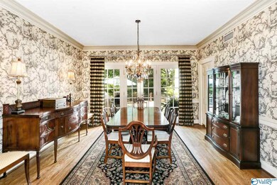 Entertaining made easy with this formal dining room that has french doors that open up to the gorgeous terrace.