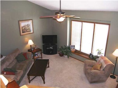 An alternate view of the living room with soaring 