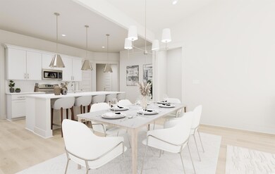 Dining room with sink and light hardwood / wood-st