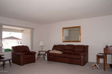 North facing window, vertical blinds.