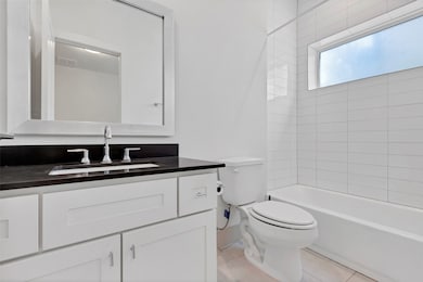 One of the two secondary bathroom is on the 1st fl