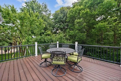 Composite deck view of woods.