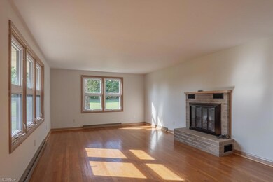 Hardwood floors Living room featuring  an electric