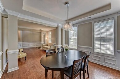The spacious Dining Room features new lighting, wa