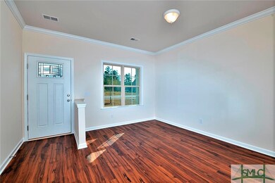 photo is of another completed home of the same flo