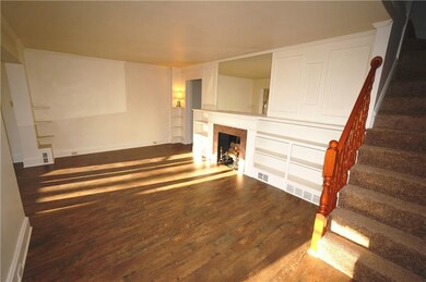 built in bookcases...gas logs to warm your toes by