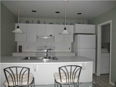 Kitchen features quaility Merillot cabinetry & con