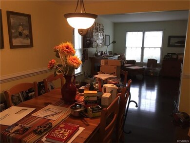 Formal dining room with wood laminate flooring, cr