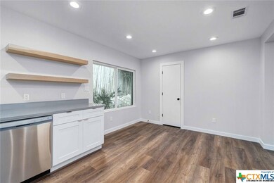 Kitchen includes full Pantry closet and custom Whi