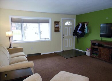 Entry from the outside of the home opens to this L