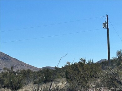 Power pole  about 200 feet away from NE corner.