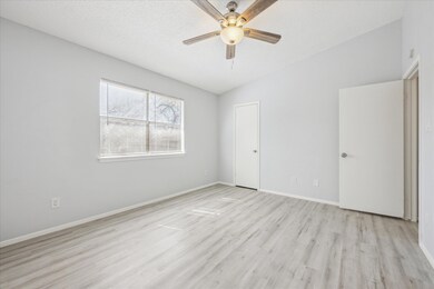 Unfurnished bedroom with light wood-type flooring
