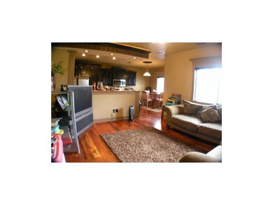 Living room into kitchen and breakfast room
