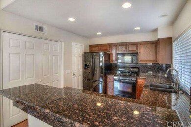 Convenient breakfast bar and walk-in pantry.