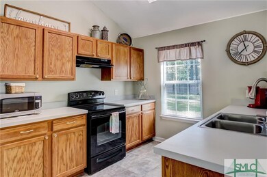 KITCHEN WITH NEW LVT FLOORING, BREAKFAST BAR, DINI