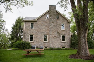 The original stone exterior and slate roof remain.