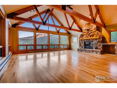 Great room with moss rock fireplace