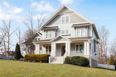 View of front of property with a front lawn and co