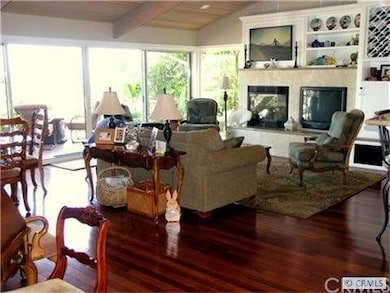 Great room with solid cherry wood floors