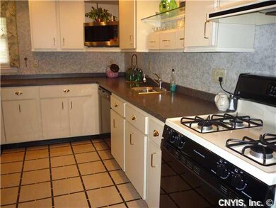 Kitchen gas stove, microwave, updated flooring