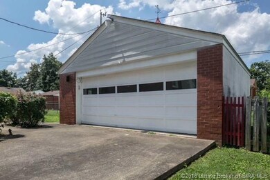 2 car garage with electrically operated overhead d
