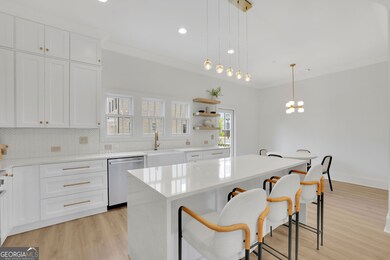 “Photos are of the model home; actual finishes may