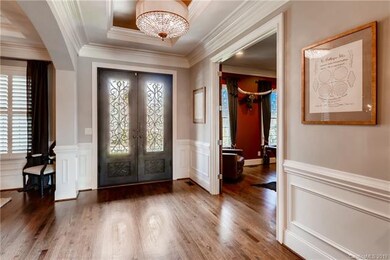 Stunning entry way features multi-piece crown mold