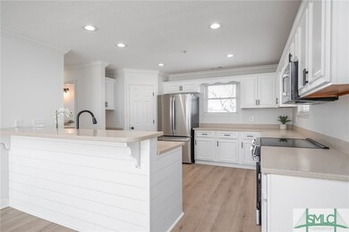 Updated Kitchen with Stainless Steel Appliances is