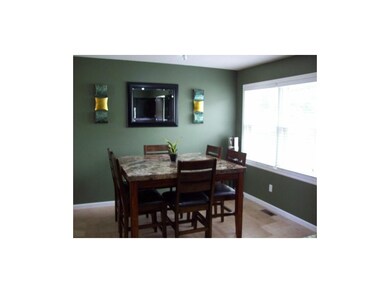 Dining area with tile floor.