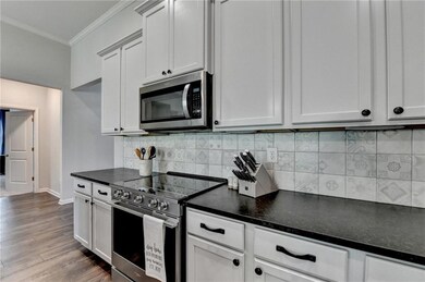 Kitchen featuring appliances with stainless steel 