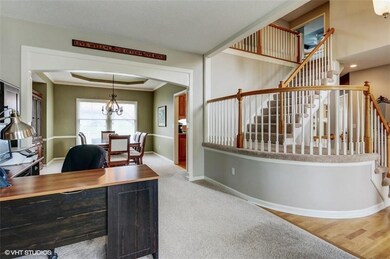 Attractive turned stairway and 2 story entry with 
