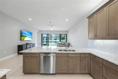 Oversized peninsula bar seating/quartz counter tops