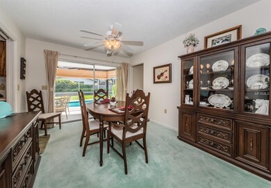 Formal Dining Room with View of Pool & Lanai