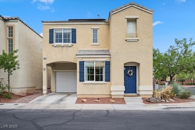 View of front of home featuring concrete driveway, roof mounted solar panels, an attached garage, and stucco siding